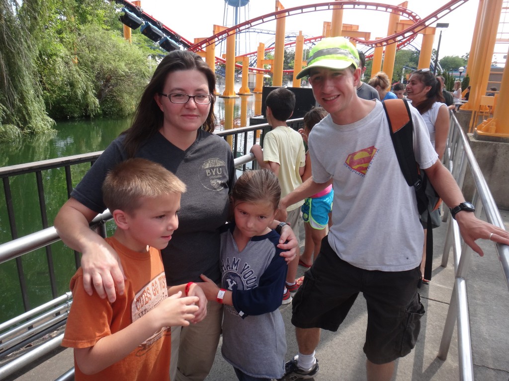 Isaac, Kathleen, Charlotte, and Bryan in line to ride the Iron Dragon